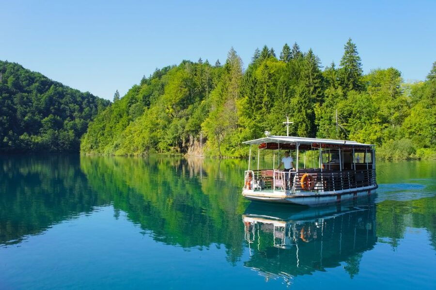From Zagreb: Plitvice Lakes & Rastoke Private Tour - Lake Kozjak boat ride: a calmer view in the middle of all that power