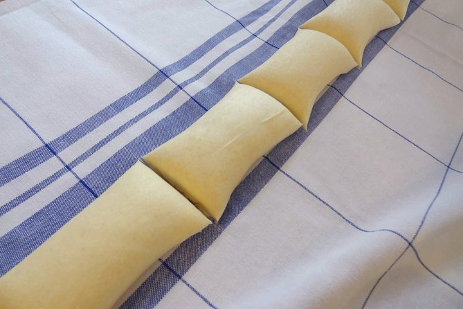 Štrukli cooking class with Dolac Market Tour - Rolling and stretching phyllo for real štrukli results